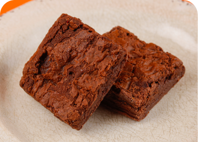 Brownie Tradicional - Suculento brownie, feito com chocolate belga meio amargo.